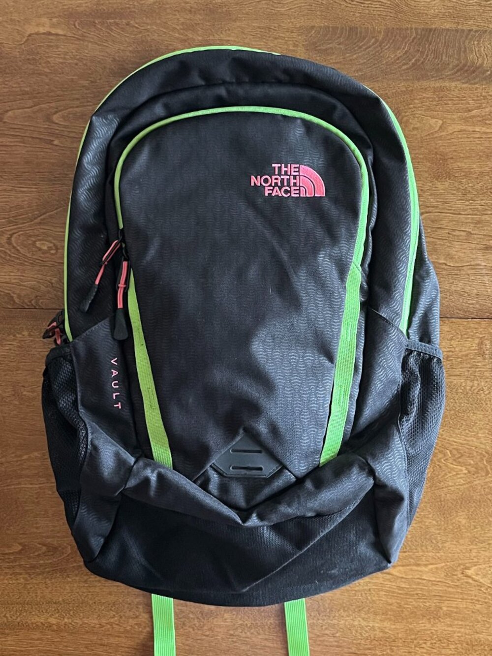 The North Face black Vault backpack with neon accents